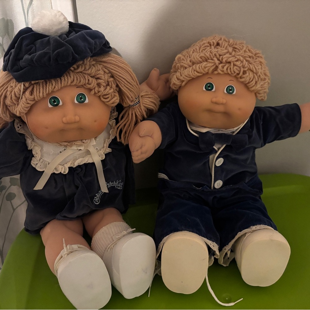 Cabbage patch kids in blue uniforms
